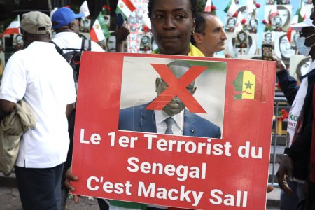 Photo for Senegalese protest in front of UN in New York. September 19, 2023, New York, USA: Senegalese protest in front of UN headquarters during UNGA 78, saying democracy has been kidnapped by the French government through their dictator puppet President - Royalty Free Image
