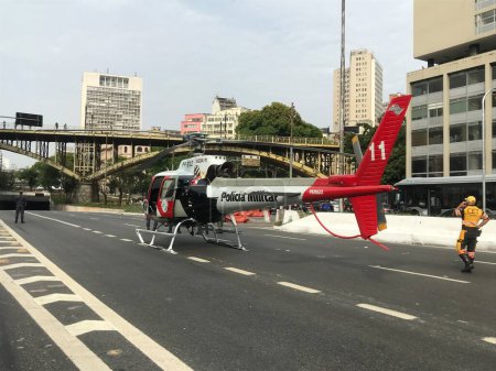Photo for SAO PAULO (SP), Brazil 09/26/2023 - A police officer was run over on his motorcycle in traffic at the Anhangabau Tunnel in Sao Paulo. He was rescued at the Santa Casa PS by the Helicopter Aguia da Military police - Royalty Free Image