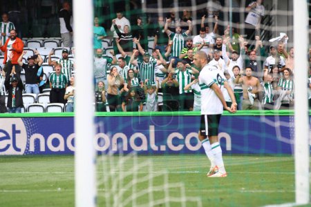 Photo for CURITIBA (PR) 01/10/2023- FOOTBALL/BRAZILIAN CHAMPIONSHIP 2023 - Coritiba's second goal scored by player number 9 Islam Slimani, during the match between Coritiba and Athletico PR valid for the 25th round of the Brazilian Championship. - Royalty Free Image