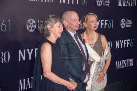 Photo for October 2, 2023, New York, United States: (L-R) Nina Bernstein Simmons, Alexander Bernstein and Jamie Bernstein attend the red carpet for Maestro during the 61st New York Film Festival at David Geffen Hall in New York City. - Royalty Free Image