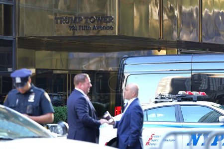Photo for Former US President Donald Trump Civil Fraud Trial. October 03, 2023 -  New York, USA : On the second day of the Trump Civil Fraud Trial, former President Donald Trump departs from his residence on 5th Avenue in Manhattan. - Royalty Free Image