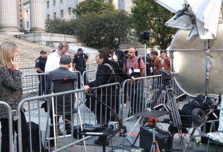 Photo for Press Corps At Donald Trump's 2nd Day Appearance for Court Fraud Trial in New York. October 3, 2023, New York, USA: Press corps waiting for the former US President, Donald Trump's arrival at the court on day two, for fraud trial in Manhattan. - Royalty Free Image