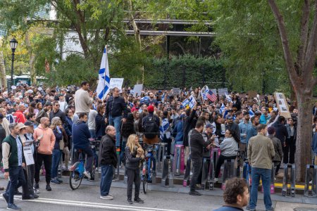 Photo for Pro-Israel Rally Held At New York City After Hamas Attack. October 8, 2023, New York, New York, USA: Hundreds of people holding banner, signs and Israeli flags gather at a pro-Israel rally outside the U.N. while the Security Council - Royalty Free Image