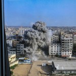 (INT) Smoke and flames billow after Israeli forces hit a high-rise tower in Gaza City. October10, 2023, Gaza, Palestine: Palestinian militants have started a 