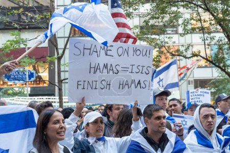 Photo for New York City Mayor Eric Adams Holds Candlelight Vigil for Victims of Terrorist Attacks in Israel. October 9, 2023, New York, New York, USA: Supporters of Israel with Israeli flags, American flags and signs rally - Royalty Free Image