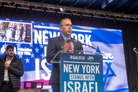 Photo for Rally And Vigil Held In New York City To Stand With Israel After Hamas Attack. October 10, 2023, New York, New York, USA: Israel Ambassador to the United Nations Gilad Erdan speaks at a New York Stands With Israel vigil and rally - Royalty Free Image