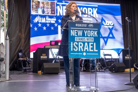 Photo for Rally And Vigil Held In New York City To Stand With Israel After Hamas Attack. October 10, 2023, New York, New York, USA: President UJA Federation of New York Linda Mirels speaks at a New York Stands With Israel vigil and rally - Royalty Free Image