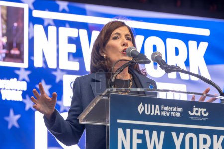 Photo for Rally And Vigil Held In New York City To Stand With Israel After Hamas Attack. October 10, 2023, New York, New York, USA: New York State Governor Kathy Hochul speaks at a New York Stands With Israel vigil and rally on October 10, 2023 - Royalty Free Image