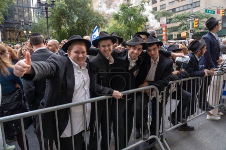 Photo for Rally And Vigil Held In New York City To Stand With Israel After Hamas Attack. October 10, 2023, New York, New York, USA: Jewish orthodox students pose for the camera at a New York Stands With Israel vigil and rally on October 10, 2023 - Royalty Free Image