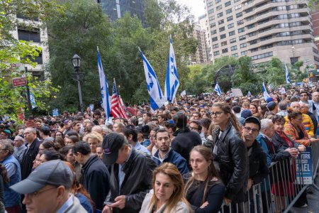 Photo for Rally And Vigil Held In New York City To Stand With Israel After Hamas Attack. October 10, 2023, New York, New York, USA: Thousands, many of them waving Israeli and American flags and carrying signs, attend a New York Stands With Israel - Royalty Free Image