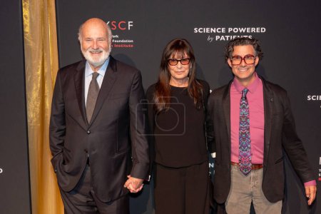 Photo for New York Stem Cell Foundation's 2023 Gala. October 10, 2023, New York, New York, USA: (L-R) Rob Reiner, Michele Singer Reiner and Derrick Rossi attend the New York Stem Cell Foundation (NYSCF) Gala and  Science Fair at Jazz - Royalty Free Image
