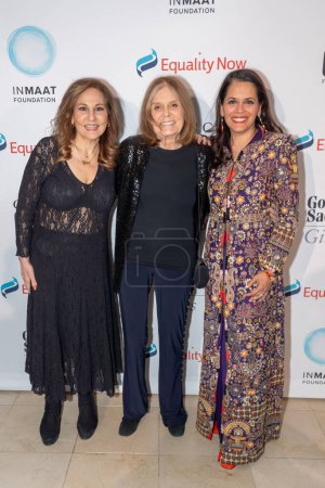 Photo for Equality Now Hosts Make Equality Reality Gala. October 11, 2023, New York, New York, USA: (L-R) Kathy Najimy, Gloria Steinem and Mona Sinha attend Equality Now Hosts Make Equality Reality Gala at Guastavino's - Royalty Free Image