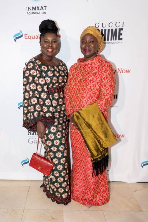 Photo for Equality Now Hosts Make Equality Reality Gala. October 11, 2023, New York, New York, USA: Janet Ramatoulie Sallah-Njie (R) attends Equality Now Hosts Make Equality Reality Gala at Guastavino's on October 11, 2023 - Royalty Free Image