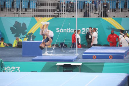 Photo for Santiago (Chile), 10/18/2023 - PANAMERICAN GAMES/SANTIAGO/TRAINING/GYMNASTICS - Athletes from the delegations of Cuba, USA, Colombia, Jamaica and Puerto Rico, participate in the men's free Artistic Gymnastics training sessions - Royalty Free Image