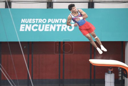 Photo for Athletes during Artistic Gymnastics free training Session. October 18, 2023, Santiago, Chile: Athletes from Colombia, Jamaica, USA, El Salvador, Puerto Rico, Cuba and others, participate in the men's Artistic Gymnastics free training - Royalty Free Image