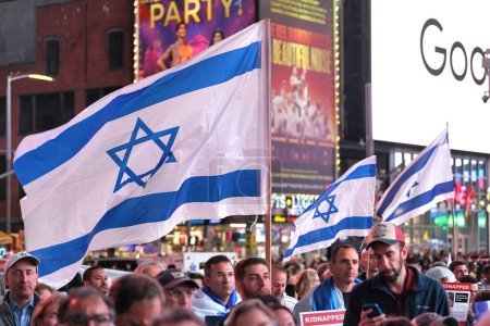 Téléchargez les photos : Rassemblement du Conseil israélo-américain à Times Square. 19 octobre 2023, Times Square, New York, États-Unis : Le rassemblement du Conseil israélo-américain à Times Square, Manhattan, Ce rassemblement a eu lieu pour exprimer leurs doléances à tous. Ramène-les à la maison." - en image libre de droit