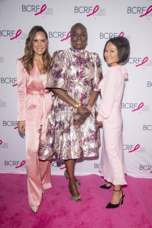 Photo for October 20, 2023 - New York, USA: (L-R) Kendra Scott, Dr. Olufunmilayo Olopade and Alina Cho the Breast Cancer Research Foundation (BCRF) New York Symposium &amp; Awards Luncheon - Royalty Free Image
