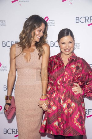 Photo for October 20, 2023 - New York, USA: Brooke Burke and Gretta Monahan attend the Breast Cancer Research Foundation (BCRF) New York Symposium &amp; Awards Luncheon - Royalty Free Image