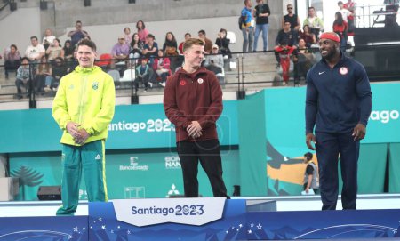 Photo for SANTIAGO, CHILE - October 23, 2023: Men's Artistic Gymnastics Final. Medal ceremony at the gymnastics center of the National Stadium, in Santiago - Royalty Free Image