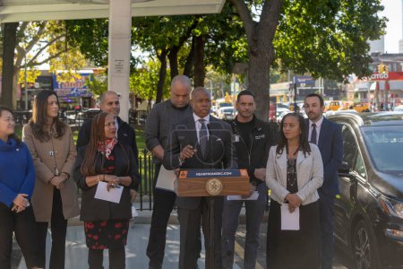 Photo for October 23, 2023 - New York, USA: Mayor Adams Signs Bill Paving Way For Electrification Of All City Government Vehicles. New York City Mayor Eric Adams speaks during Intro. 279-A bill signing ceremony at NYCHA&#39;s Ravenswood Houses - Royalty Free Image