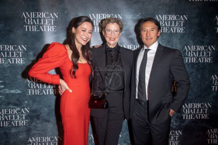 Photo for October 24, 2023 - New York, USA: (L-R) Elizabeth Chai Vasarhelyi, Annette Bening and Jimmy Chin attend the American Ballet Theatre Fall Gala at David H. Koch Theater at Lincoln Center on October 24, 2023 in New York City. - Royalty Free Image