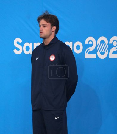 Photo for SANTIAGO (CHL), 10/23/2023: Medal ceremony in the men's 100 backstroke won by the American ADAM CHANEY (gold), the Argentinean SARAVIA U (silver) and the Canadian BLAKE TIERNEY (bronze) at the National Stadium. - Royalty Free Image