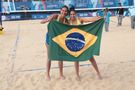 Photo for Santiago (Chile), 10/27/2023 - Brazilians Duda and Ana Patricia are Champions in the Pan-American Beach Volleyball Final against Canadians Melissa Humana -Paredes and Brandie Wilkerson - Royalty Free Image