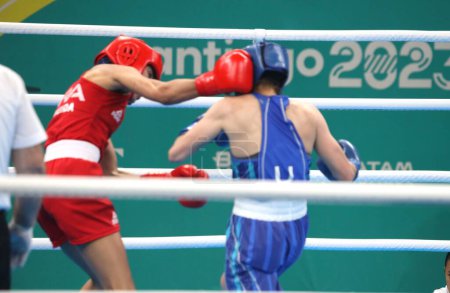 Photo for SANTIAGO (Chile), 10/27/2023 - Women's boxing final under 50kg for the 155 gold medal between Brazilian Barbosa De Almeida Caroline and American Lozano Jennifer at the Olympic Training Center during the 2023 Pan American Games - Royalty Free Image