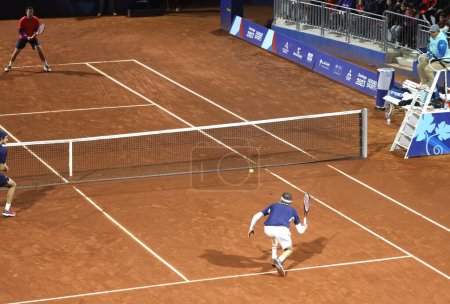 Photo for SANTIAGO (Chile), 10/28/2023 - Men's doubles final for the gold medal between the Brazilians HEIDE Gustavo, DEMOLINER Marcelo and the Chileans BARRIOS Tomas,TABILO Alejandro on the central sports court - Royalty Free Image