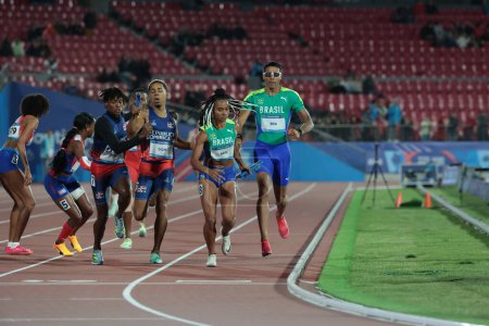 Photo for Santiago (Chile), 10/30/2023 -  The 4 x 400m Mixed Relay, at the Coliseo del Estadio Nacional Julio Martinez in Santiago, Chile where the Pan American Games take place - Royalty Free Image