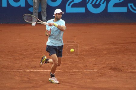 Photo for SANTIAGO (Chile), 10/29/2023 -  Argentine Facundo Diaz won the gold medal in the men's singles tennis, beating Chilean Tomas Barrios 6-3 and 7-6, during the Pan American Games 2023 and at the National Stadium Tennis Center - Royalty Free Image