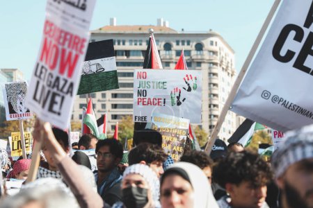 Photo for Palestinians Protest From Freedom Plaza to The White House. November 4, 2023, New York, USA: Palestinian protestors march from Freedom Plaza to the White House to protest against Israels attacks on Palestinians - Royalty Free Image