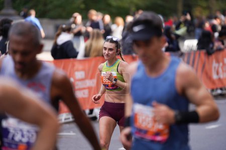 Photo for TCS New York City Marathon 2023. November 05, 2023 , New York ,USA:  Ethiopia's Tamirat Tola smashes records, winning the NYC Marathon men's race in 2:04:58, while Hellen Obiri of Kenya dominates the women's race with a time of 2:27:23. - Royalty Free Image