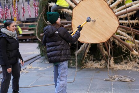 Photo for Christmas tree Arrives in Rockefeller Center. November 11, 2023 ,New York, USA:  The arrival of the iconic Rockefeller Center Christmas tree in Midtown Manhattan last night marked the start of the holiday season. Hailing from Vestal. - Royalty Free Image