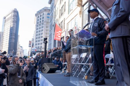 Photo for Veteran's Day Parade Held In New York City. November 11, 2023, New York, New York, USA: New York Mayor Eric Adams speaks in the annual Veterans Day Parade on November 11, 2023 in New York City. Adams recently had his phone and iPad - Royalty Free Image