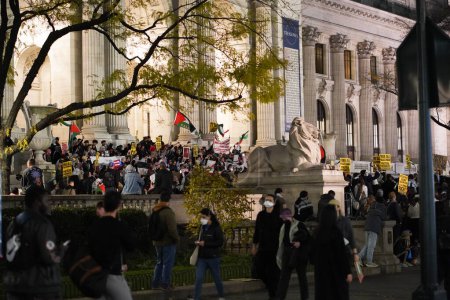 Photo for Pro Palestinian Protest . November 17 , 2023 . New York  , USA :  Tonight, in front of the New York Public Library on 5th Ave. in Manhattan, a pro-Palestinian protest fervently advocated for an end to the 42-day-long conflict - Royalty Free Image