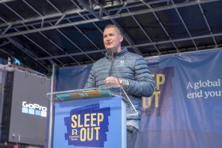 Photo for Covenant House Hosts "Sleep Out" To Help End Youth Homelessness. November 16, 2023, New York, New York, USA: Bill Bedrossian, President and Chief Executive Officer of Covenant House International, speaks at Covenant House's "Sleep Out" - Royalty Free Image