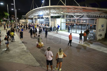 Photo for (INT) Taylor Swift Fans Seen Leaving Nilton Santos Stadium -Rio, after her show. November 20, 2023, Rio de Janeiro, Brazil: Taylor Swift Fans Seen Leaving Nilton Santos Stadium -Rio, after her show. This was the show canceled on Saturday (18) due to - Royalty Free Image
