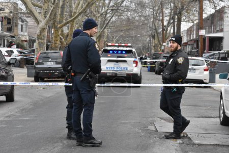 Photo for One person was killed and one is in stable condition after an assault outside of a home in Brooklyn, New York. December 7, 2023, Brooklyn, New York, USA: Outside a Gravesend Brooklyn home two people were assaulted at a home on West 9th Street - Royalty Free Image