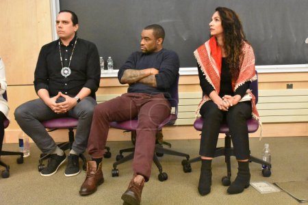 Photo for Noura Erakat (right), Marc Lamont Hill (middle), and Nick Estes (left) attend the Race, Liberation, and Palestine event at Rutgers University in New Brunswick, New Jersey. December 7, 2023, New Brunswick, New Jersey, USA - Royalty Free Image