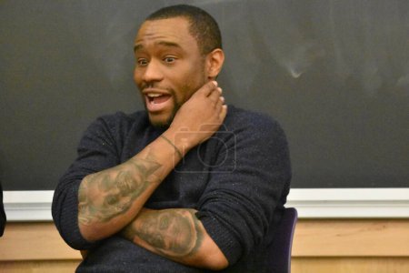 Photo for Marc Lamont Hill delivers remarks at the event at Rutgers University. Noura Erakat (not shown), Marc Lamont Hill (shown), and Nick Estes (not shown) attend the Race, Liberation, and Palestine event at Rutgers University in New Brunswick, New Jersey. - Royalty Free Image