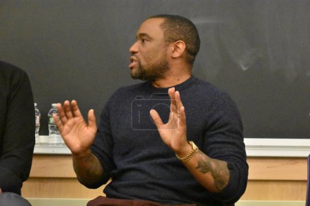 Photo for Marc Lamont Hill delivers remarks at the event at Rutgers University. Noura Erakat (not shown), Marc Lamont Hill (shown), and Nick Estes (not shown) attend the Race, Liberation, and Palestine event at Rutgers University in New Brunswick, New Jersey. - Royalty Free Image
