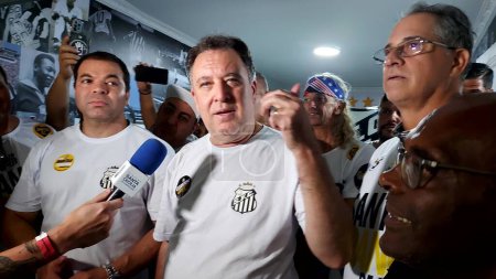 Photo for SANTOS (SP), Brazil 12/09/2023 -  Marcelo Teixeira, from Chapa 5, is the new President of Santos Futebol Clube da Vila Belmiro. After being declared victorious, he went to the committee to celebrate with his collaborators. - Royalty Free Image