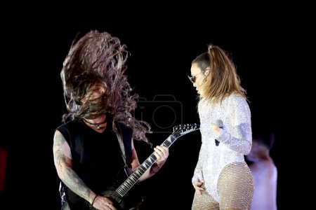 Photo for Rio de Janeiro (RJ),  Brazil 12/20/2023 - Participation of musician and guitarist Andreas Kisser from Sepultura at Show Ivete 3.0 in celebration of 30 years of her career, singer Ivete Sangalo, - Royalty Free Image