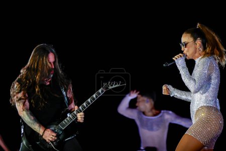 Photo for Rio de Janeiro (RJ),  Brazil 12/20/2023 - Participation of musician and guitarist Andreas Kisser from Sepultura at Show Ivete 3.0 in celebration of 30 years of her career, singer Ivete Sangalo, - Royalty Free Image