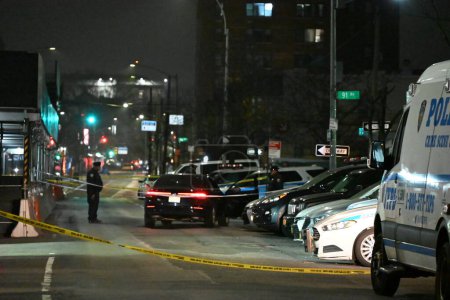 Photo for Two people shot, one person dead in a shooting in Queens, New York. December 27, 2023, Queens, New York, USA: Scene at the 103rd NYPD Precinct. A 28-year-old female and a 39-year-old male were shot at 127th Street and Liberty Avenue in Queens - Royalty Free Image