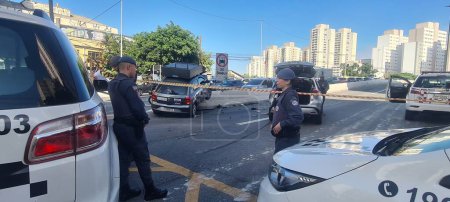 Photo for SAO PAULO (SP), 12/27/2023 - Police pursuit on Av Rio Branco on the corner of Alameda Eduardo Prado left four people arrested after kidnapping. The prisoners were taken to the 2nd DP to prepare reports. - Royalty Free Image