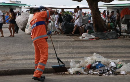 Photo for RIO DE JANEIRO (RJ), BRAZIL 01/01/2024 - COMLURB employees work intensely this morning (01) to remove tons of rubbish on the first day of the year after the New Year's Eve party at Copacabana beach - Royalty Free Image