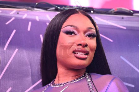 Photo for Megan Thee Stallion performs at Dick Clark's New Year's Rockin' Eve With Ryan Seacrest 2024 in Times Square in Manhattan, New York. December 31, 2023, Manhattan, New York, USA: Megan Thee Stallion performs at Dick Clark's New Year's Rockin' Eve - Royalty Free Image