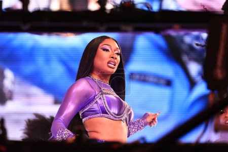 Photo for Meghan Thee Stallion Performs at New Year's Eve at Times Square. December 31, 2023, New York, USA: American Rapper, Megan Jovon Ruth Pete, known professionally as Megan Thee Stallion, from Houston, Texas, performs live at New Year's Eve - Royalty Free Image